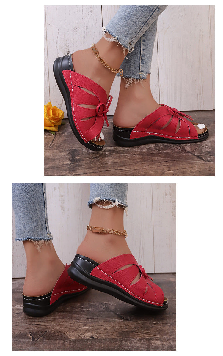 Sandalias de cuña plana con lazo calado