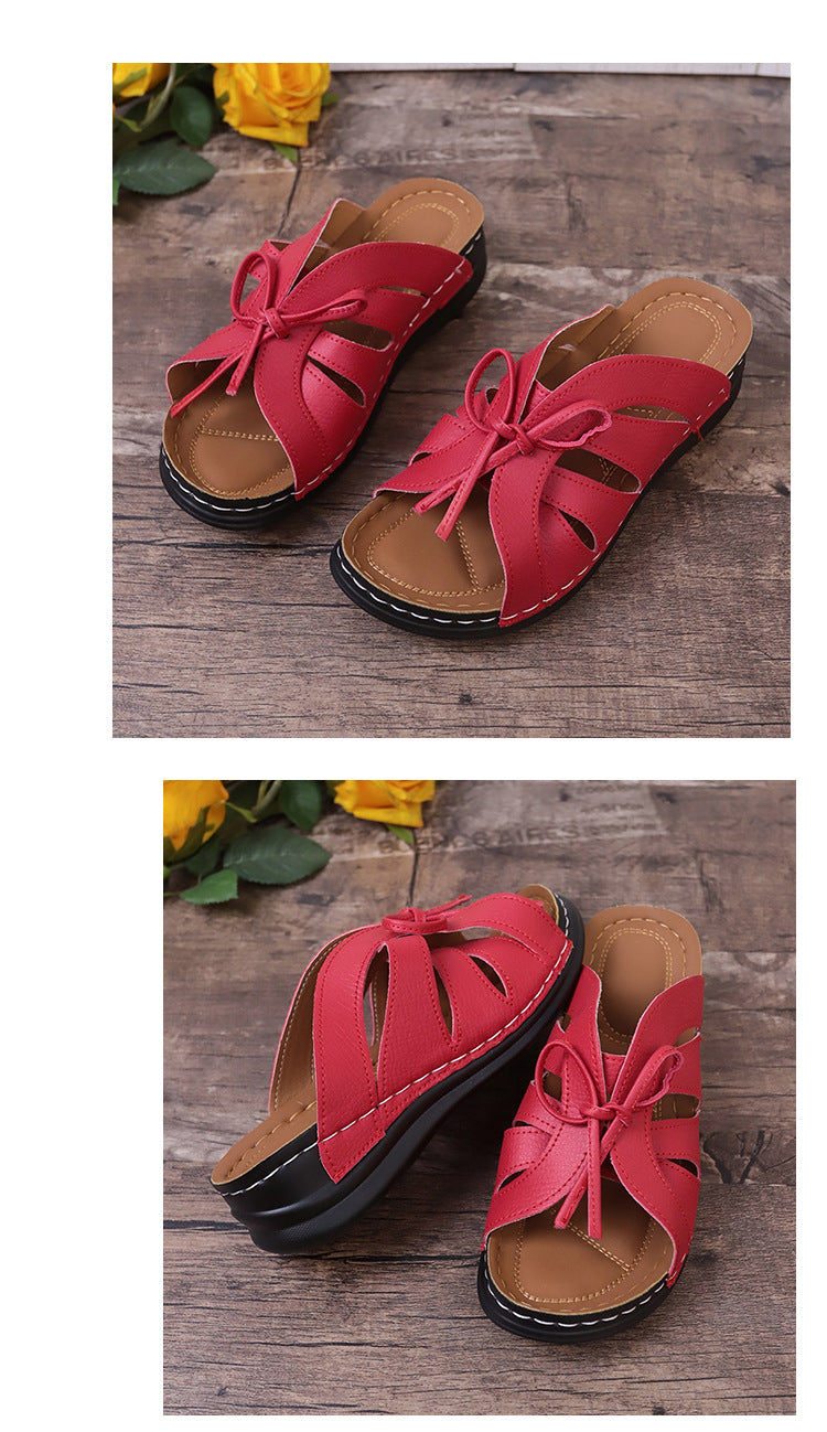 Sandalias de cuña plana con lazo calado